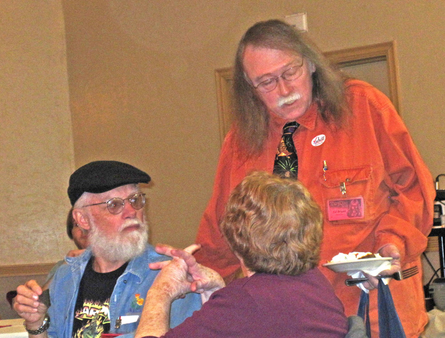 Ed Bryant schmoozing with Legendary Fan Guests John & Bjo Trimble